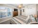 Bedroom with ceiling fan and neutral walls and floor at 6211 Sun Blvd # 206, St Petersburg, FL 33715