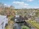 Aerial view of bridge over canal, community buildings in background at 7224 E Bank Dr # 206, Tampa, FL 33617