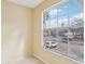 Hallway with large window for natural light overlooking parking and neighborhood at 7224 E Bank Dr # 206, Tampa, FL 33617