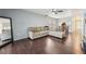 Inviting living room with wood floors, ceiling fan, and neutral colors create a relaxing space at 7224 E Bank Dr # 206, Tampa, FL 33617