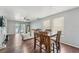 Bright living room with hardwood floors and a sliding door to the outdoors at 7224 E Bank Dr # 206, Tampa, FL 33617