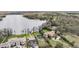 Expansive aerial view of the lakefront properties with pools and private docks at 7730 N Mobley Rd, Odessa, FL 33556