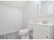 Bright bathroom with white fixtures and hard surface floors at 7730 N Mobley Rd, Odessa, FL 33556