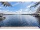 Scenic lake view from the wooden dock at 7730 N Mobley Rd, Odessa, FL 33556