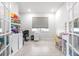 Bright home office space with storage, and large windows at 8435 Ocean Tides Cv, Parrish, FL 34219