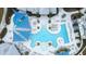 Overhead view of a modern pool with multiple decks, sunshades and lounge chairs at 8435 Ocean Tides Cv, Parrish, FL 34219