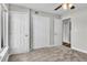 This bedroom features carpet, two closets and an entrance to another room in the home at 8640 Tahoe Ct # 16, Tampa, FL 33614