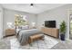 Comfortable bedroom with a cozy bed, stylish decor, and plenty of natural light for a relaxing atmosphere at 8640 Tahoe Ct # 16, Tampa, FL 33614