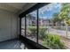 Screened in patio with a view of the community landscaping at 8640 Tahoe Ct # 16, Tampa, FL 33614