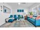 Bright living room with stylish decor, comfortable seating, and lots of natural light at 9715 Harrell Ave # 22, Treasure Island, FL 33706