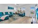 Bright living room with stylish decor, comfortable seating, and lots of natural light at 9715 Harrell Ave # 22, Treasure Island, FL 33706