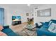 Comfortable living room featuring modern decor and a relaxing seating area at 9715 Harrell Ave # 22, Treasure Island, FL 33706