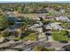 An aerial view of a neighborhood featuring tree-lined streets and well-maintained homes at 1015 55Th S Ave, St Petersburg, FL 33705