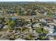 Aerial shot showcasing a neighborhood with tidy homes, lush greenery and easy access to urban amenities at 1015 55Th S Ave, St Petersburg, FL 33705