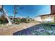Expansive backyard featuring a covered patio and lush landscaping, perfect for outdoor living at 1015 55Th S Ave, St Petersburg, FL 33705