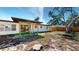 Backyard featuring a patio and mature tree offers a peaceful outdoor retreat at 1015 55Th S Ave, St Petersburg, FL 33705