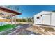 Backyard featuring a covered patio and shed, adding functionality and outdoor enjoyment at 1015 55Th S Ave, St Petersburg, FL 33705