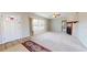 Bright living room features a decorative front door, large window, and a fireplace at 1015 55Th S Ave, St Petersburg, FL 33705