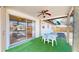Inviting covered patio with ceiling fan, perfect for outdoor dining and entertaining at 1015 55Th S Ave, St Petersburg, FL 33705