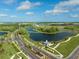 Beautiful aerial view featuring tranquil lakes and surrounding community at 10410 Cross River Trl, Parrish, FL 34219