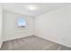 Neutral carpet in this bedroom with natural lighting and a single window at 10410 Cross River Trl, Parrish, FL 34219