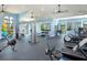 Well-equipped fitness center with modern exercise machines, free weights, and ample space for workouts at 10410 Cross River Trl, Parrish, FL 34219