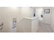 Hallway with carpet flooring and a view of an office at 10627 Hatteras Dr, Tampa, FL 33615