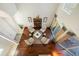 Aerial view of open floor plan featuring hardwood flooring, neutral decor, and ample natural light at 10627 Hatteras Dr, Tampa, FL 33615