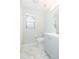 Modern bathroom with a window, vanity, and toilet at 10906 Kensington Park Ave, Riverview, FL 33578