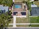 Aerial view of a single-Gathering home with a pool and solar panels on the roof at 11206 Mondale Ave, Seffner, FL 33584