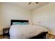 Comfortable bedroom with a large bed, wood floors, and a closet for ample storage space at 11257 Egeria Dr, Odessa, FL 33556
