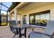 Inviting patio with comfortable seating, perfect for enjoying outdoor meals and scenic views at 11257 Egeria Dr, Odessa, FL 33556