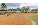 A vibrant community playground featuring various play structures set in a bark-covered area at 11257 Egeria Dr, Odessa, FL 33556