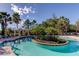 Stunning pool area with a circular island, cozy cabana, and comfortable sun loungers at 11257 Egeria Dr, Odessa, FL 33556