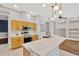 Bright kitchen features stainless steel appliances, counter seating, and tile flooring at 1166 Lumsden Trace Cir, Valrico, FL 33594