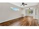 Spacious living room with wood flooring and views of the outdoors at 1166 Lumsden Trace Cir, Valrico, FL 33594