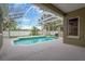 Sparkling screened pool with ample space for lounging and entertaining at 1166 Lumsden Trace Cir, Valrico, FL 33594