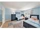 Bright bedroom with two twin beds, neutral carpet, and ample natural light at 139 Bluff View Dr # 105, Belleair Bluffs, FL 33770