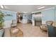 Welcoming lobby with comfortable seating and a view of the elevator at 139 Bluff View Dr # 105, Belleair Bluffs, FL 33770