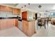 Open kitchen with granite countertops and stainless steel dishwasher at 1400 Gulf Blvd # 204, Clearwater Beach, FL 33767