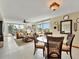 Bright living and dining area with tile floors, comfortable seating, and lots of natural light at 1400 Gulf Blvd # 204, Clearwater Beach, FL 33767