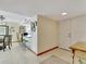 Open-concept living space with a breakfast bar and tile floors, providing a seamless flow at 1400 Gulf Blvd # 204, Clearwater Beach, FL 33767