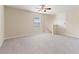 Upstairs bonus room with carpet flooring and natural light from window at 18855 Hampstead Heath Ct, Land O Lakes, FL 34638