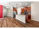 Spacious kitchen featuring stainless steel appliances, granite counters and modern lighting at 18855 Hampstead Heath Ct, Land O Lakes, FL 34638
