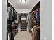 Spacious walk-in closet with custom shelving and ample hanging space for clothing and accessories at 308 S Arrawana Ave, Tampa, FL 33609