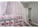 bedroom featuring a bunk bed with canopy, and wood floors at 4037 Auston Way, Palm Harbor, FL 34685