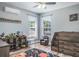 Fun bedroom featuring hardwood floors, a toy collection, and a bunk bed at 4037 Auston Way, Palm Harbor, FL 34685