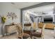 Dining area with a glass table, ornate chairs, and decorative wall art at 4037 Auston Way, Palm Harbor, FL 34685