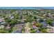 An aerial view of a home surrounded by lush greenery in a well-established neighborhood at 5909 Canton S St, St Petersburg, FL 33712