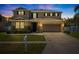 Charming two-story home with well-manicured lawn, tasteful landscaping, and a two-car garage at 5909 Canton S St, St Petersburg, FL 33712
